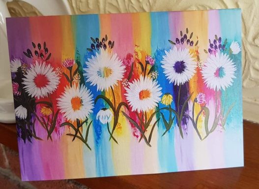 Multicoloured abstract flowers with daisies against a vibrant striped background.