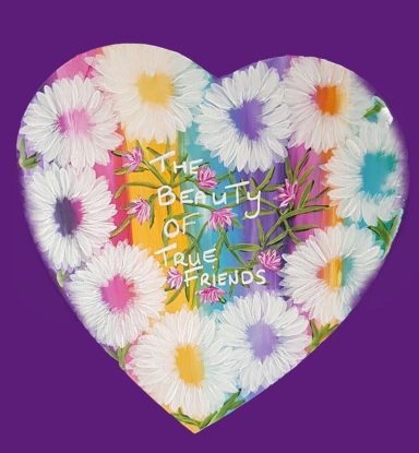 Colourful heart-shaped design with flowers and the text "The Beauty of True Friends."