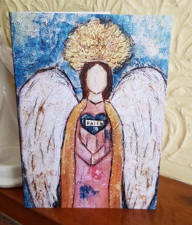 A vibrant painting of an angel with large wings and a golden halo.