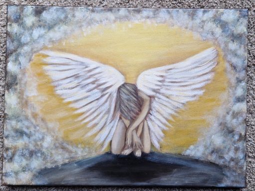 An Angel kneeling, surrounded by a soft, golden glow.
