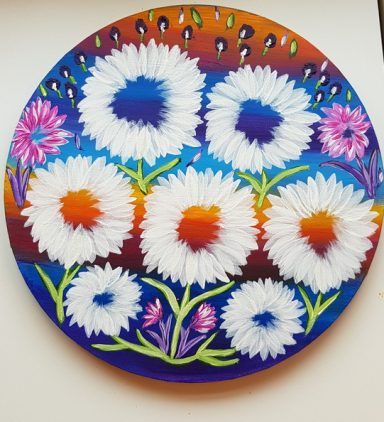 Colourful floral artwork featuring white and pink flowers against a vibrant background.