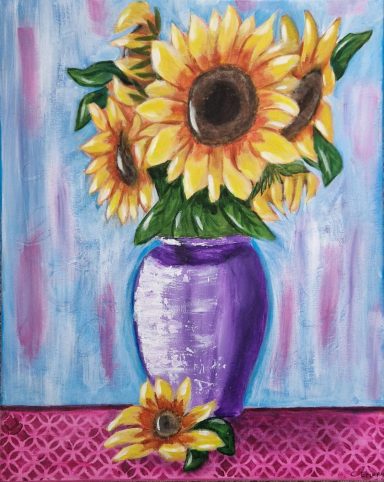 A vibrant bouquet of sunflowers in a purple vase against a blue background.