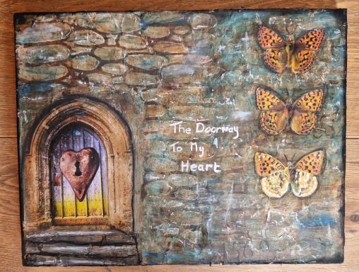 A stone wall with a heart-shaped door and three decorative butterflies.