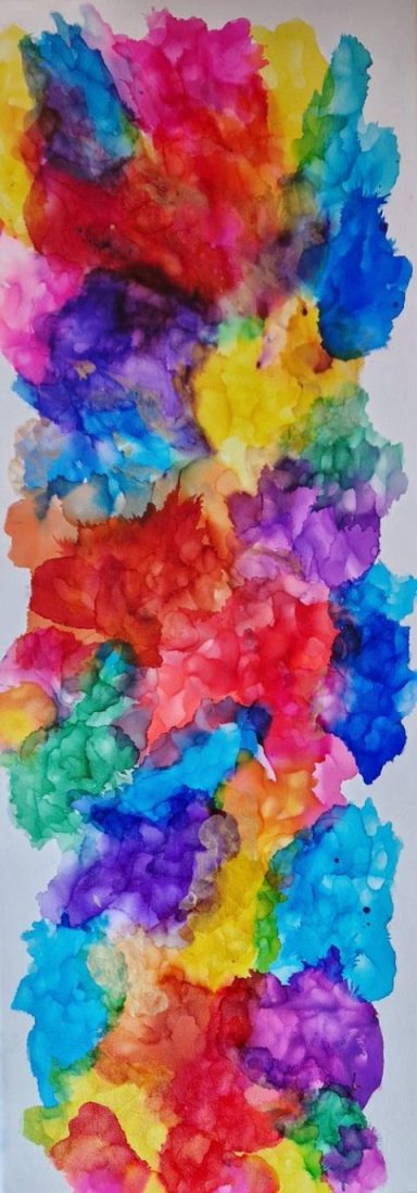 Abstract composition of vibrant colours in hues of red, blue, yellow, and green.